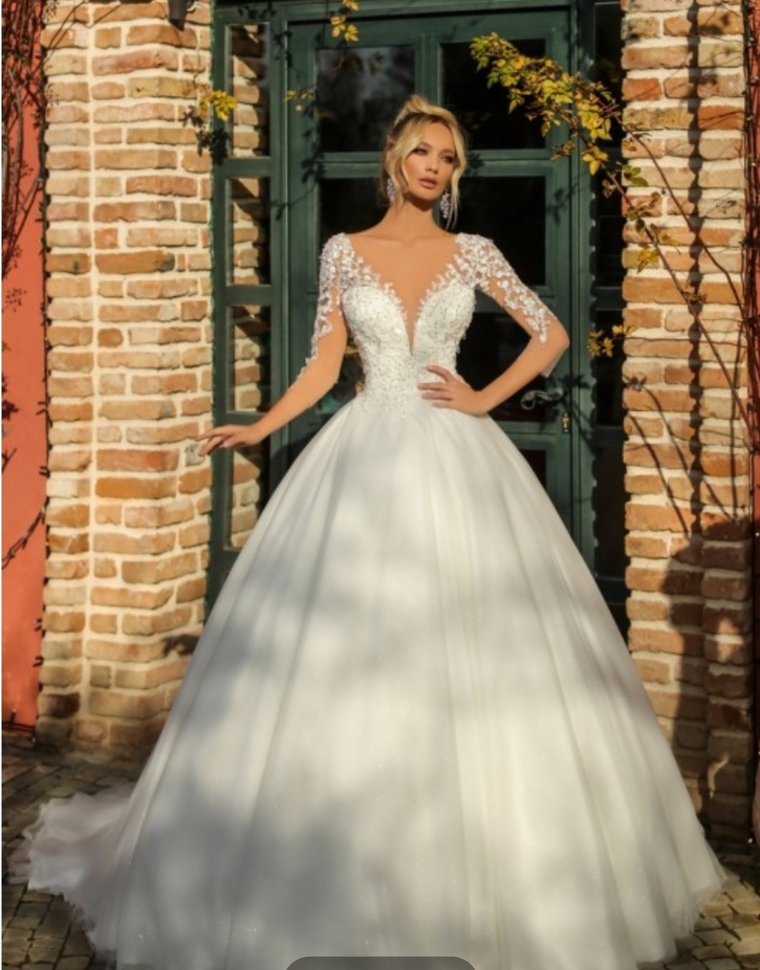 Perle brudekjole med ærmer